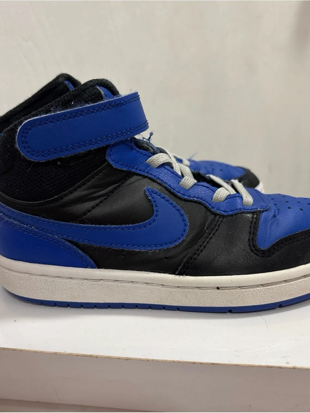 Nike Kids Mid-Top Sneakers in Black and Royal Blue